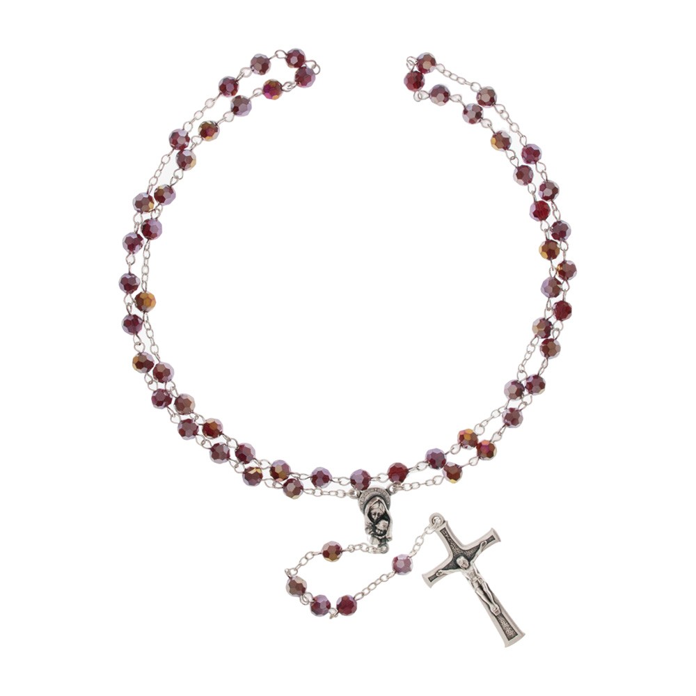 Antique rosary in store garnet glass and silver metal. Religious gift.