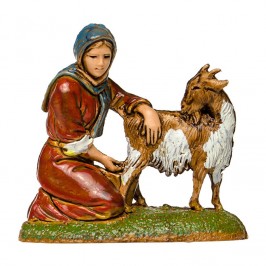 Woman Kneeling Milking a Goat